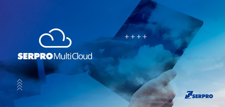 Imagem mostra close de duas mãos operando um tablet em meio a nuvens